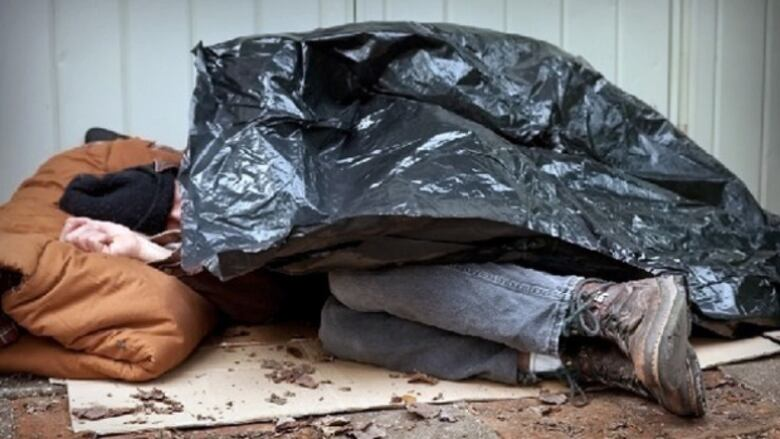 Homeless man in a disaster zone