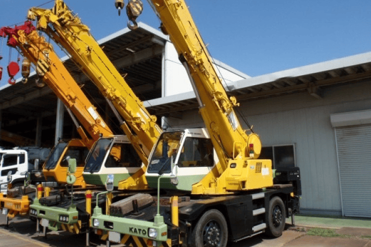Small yellow city cranes
